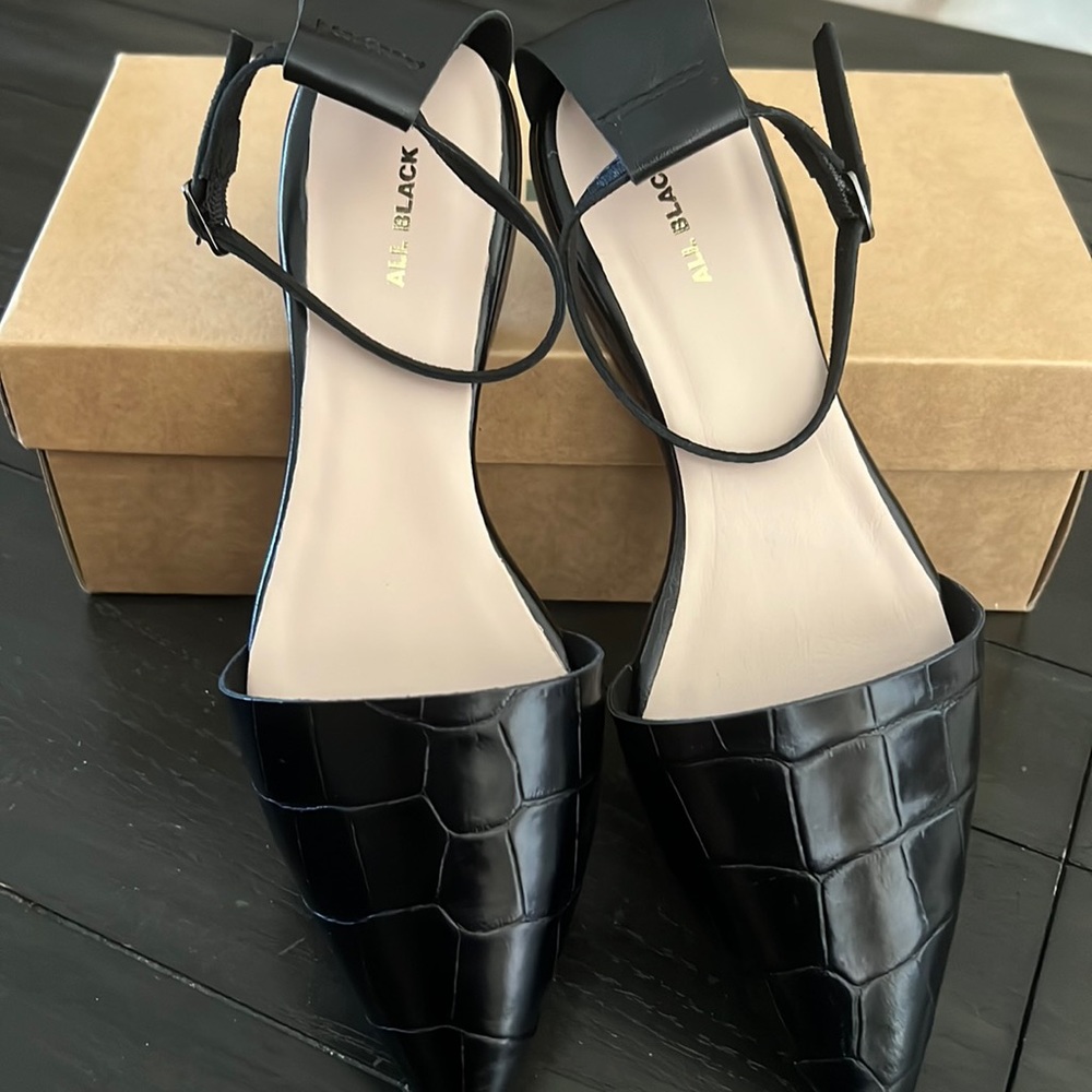 All Black Pressed Sling Wrap Flats. All Black purchased from Anthropologie